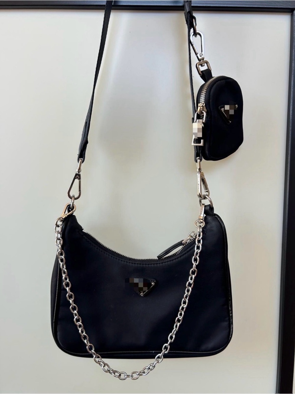 Black Shoulder Bag with Chain Accent and Detachable Coin Pouch